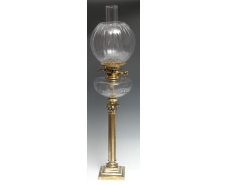 A Victorian gilt-brass and glass columnar oil lamp, fluted shade and cut-glass reservoir, Corinthian capital, square plinth b