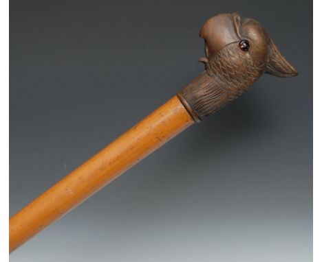 A 19th century novelty automaton walking stick, the substantial Black Forest type handle carved as the head of a parrot, arti