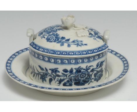 A Worcester drum shaped butter tub, cover and stand, with two lug handles, decorated in underglazed blue, with flowers, cell 
