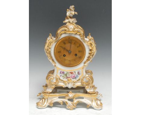 A 19th century Louis XV Revival cartouche-shaped porcelain mantel clock, 7.5cm engine-turned brass dial inscribed with Roman 