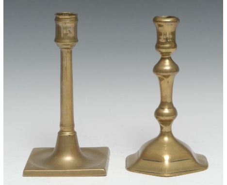 A George I brass candlestick, of seamed construction, dished square base, 18.5cm high, c.1710; another, George II, hexagonal 