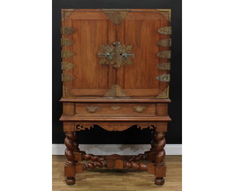 A brass mounted camphor cabinet on stand, of Queen Anne inspired design, flush rectangular top above a pair of panel doors en