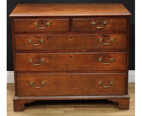 A George III oak chest, rectangular top with moulded edge above two short and three long graduated drawers, brass swan neck h