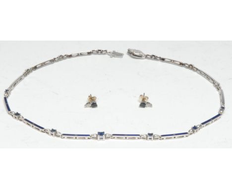 A Faberge limited edition sapphire, diamond and blue enamel necklace with stud earrings en suite, the necklace inset with fou