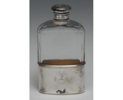 A Victorian silver mounted hip flask, screw-fitting cover, push-fitting stirrup cup to base with gilt interior, crested, 14.5