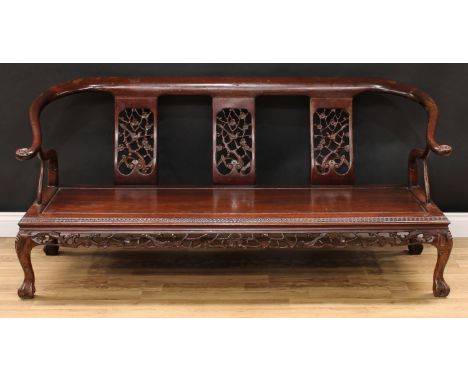 A Chinese hardwood triple yoke back horseshoe sofa, downswept arms terminating in outswept scroll hand rests, each splat pier