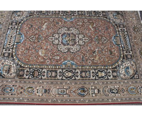 A woollen carpet, worked in the Middle Eastern manner with architectural landscapes, figures, animals and classical devices, 