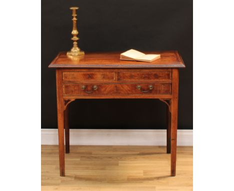 A George III oak crossbanded mahogany side table, oversailing rectangular top with moulded edge above two short and one long 