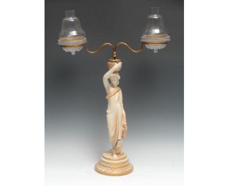 A Royal Worcester figural table lamp, made for Clarke's Cricklite Lamps, she stands wearing flowing robes holding an amphora,