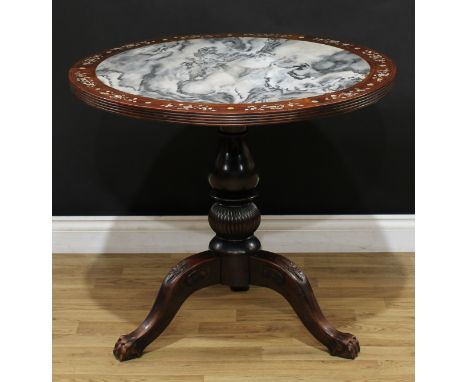 A Chinese hardwood tripod centre table, circular top with inset dreamstone panel and inlaid in mother-of-pearl with a border 