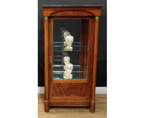 A French Empire design mahogany display cabinet, rectangular marble top above a three-quarter glazed door enclosing a shelf, 