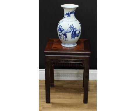 A Chinese hardwood vase or jardiniere stand, panel top above a deep frieze pierced and carved with stylised lotus, square leg