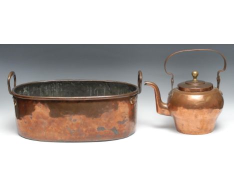 A 19th century copper oval fish kettle, raised carrying handles, 50cm wide, c.1850; a 19th century French copper kettle, mark