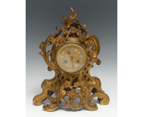 A 19th century French ormolu mantel clock, 7cm circular dial inscribed Hry. Marc A Paris, with Roman numerals upon enamel car