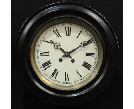 A 19th century ebonised circular wall clock, 23cm enamel dial inscribed with Roman numerals, twin winding holes, 8 day moveme
