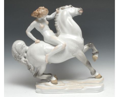 A Herand Hungary model, of a female nude riding a horse bareback, 45cm high, printed marks 