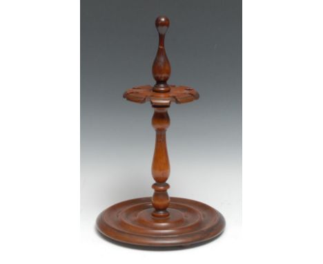 Treen - a 19th century mahogany chrurch warden pipe stand, turned finial and circular base, 38cm high, c.1850 
