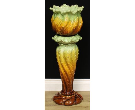 A Leeds Art Pottery jardinière and stand, moulded with scrolling acanthus, 87cm high, impressed mark, model no. 367D, c. 1890