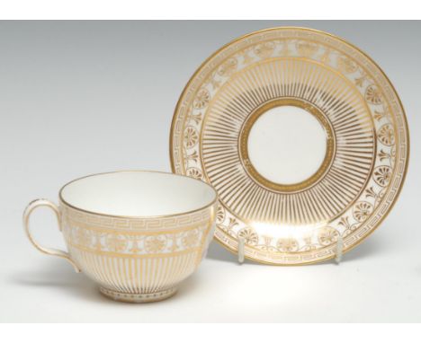 A Minton teacup and saucer, well painted iwth cherub slepping on a cloud, the ground with vertical gilt lines,  globe mark 