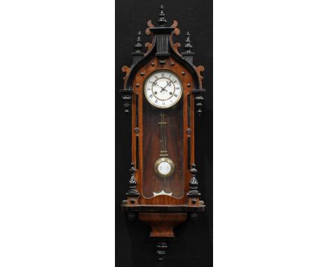 A 19th century walnut and ebonsied Vienna wall clock, by Junghans, 13cm enamel dial inscribed with Roman numerals, twin windi