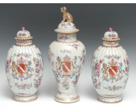 A pair of French Samson 'Chinese' lobed ovoid armorial vases and covers, decorated in the famille rose palette, with crest an