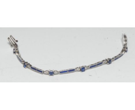 A Faberge limited edition 18ct white gold sapphire, diamond and blue enamel bracelet, inset with twelve diamonds and six blue