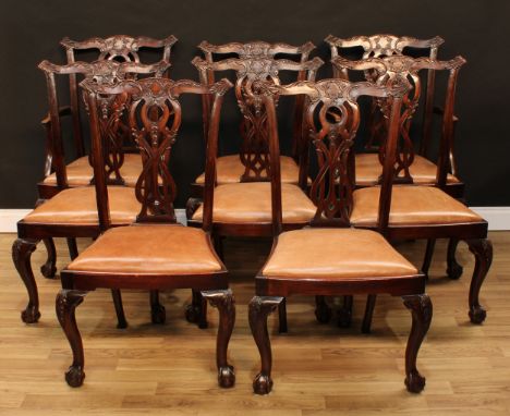 A set of eight Chippendale Revival mahogany dining chairs, comprising a pair of carvers and six side chairs, each with a cupi