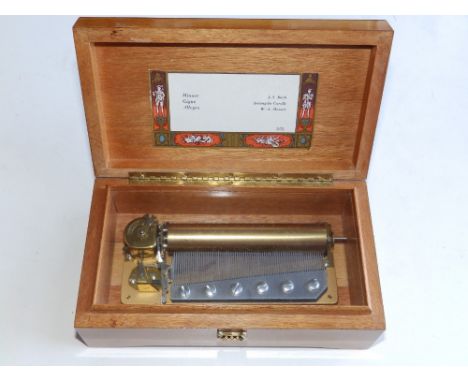A modern Swiss musical box playing three airs on a 4.5" cylinder - Reuge, 8" overall.