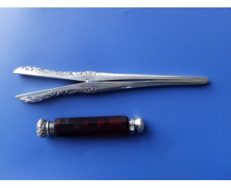 A late Victorian silver-topped double ended ruby glass scent bottle - Birmingham 1900,  4.1" and a pair of silver glove stret