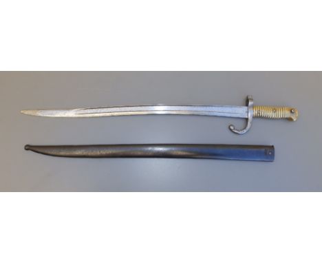 A French chassepot sword bayonet in scabbard - St. Etienne, July 1875, 28.5" overall.