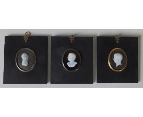 A 19thC white cameo style glass miniature portrait bust of Napoleon Bonaparte, moulded lettering 'BONAPARTE' at base, and two