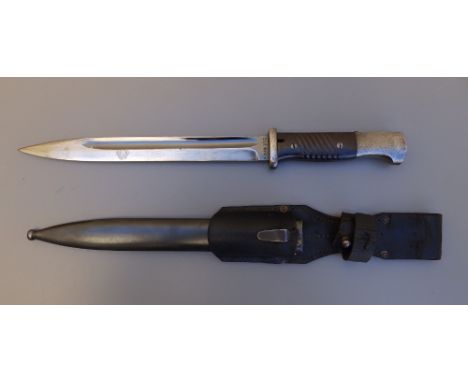 A German Mauser K98 bayonet by E.U.F. Horster, 1940, with scabbard &amp; frog, matching numbers 8054,   16" overall.