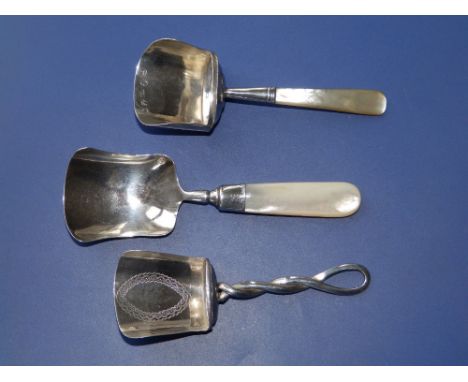 A Regency silver shovel-shaped caddy spoon with mother-of-pearl handle - Birmingham 1814, 3.6", one other and an unmarked sho