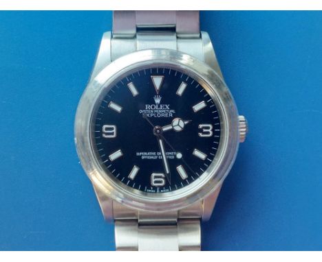 A boxed gent's stainless steel Rolex Oyster Perpetual Explorer 114270  bracelet wrist watch, the black dial with luminous han