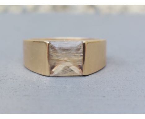 A boxed Cartier 18ct gold ring set with a single rectangular colourless stone - N19520 59cs.  Finger size R.