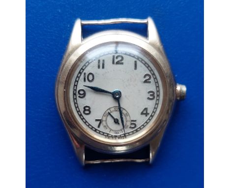 A vintage 9ct gold Rolex Oyster manual wind watch with presentation inscription to reverse 'Rev. W.H. Maundrell….1932-1940'  