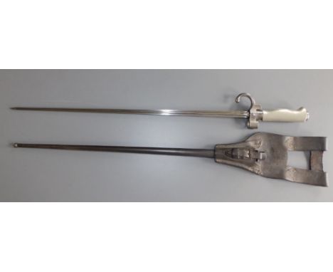A French 1886 Model 'Lebel' bayonet in scabbard, 25" overall, with rare leather frog.