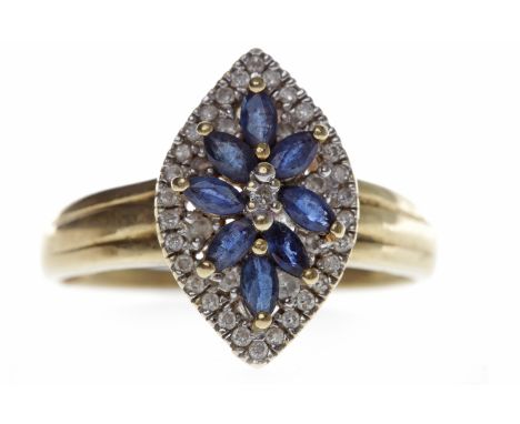 FOURTEEN CARAT GOLD BLUE GEM AND DIAMOND CLUSTER RING
the marquise shaped bezel 17.4mm long and set with marquise cut blue ge