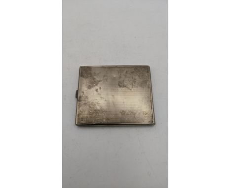 A white metal cigarette case having an engine turned design and gilt interior 119gLocation:If there is no location report sho