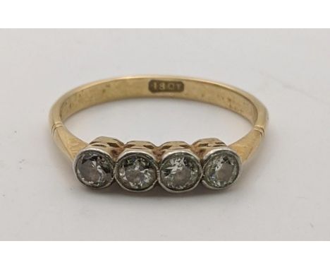 A 18ct gold and four stone diamond ring, size M 1/2, 2.2gLocation:If there is no condition report shown, please request 