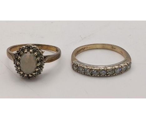 Two 9ct gold rings to include an opal and diamond ring, size O, together with 9ct gold and paste stone ring, size Q, total we