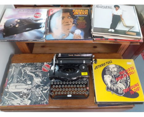 A vintage Smith Premier typewriter together with a quantity of 1970's LP's to include Deep Purple, Jethro Tull and Michael Ja