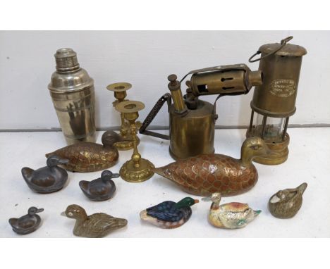 A collection of metalware to include a Ferndale coal miners lamp, a 1926 British Monitor blowtorch, various duck figures and 