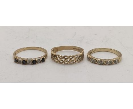 Three gold rings to include two 9ct gold rings, one set with blue sapphires and diamonds and one other together with a yellow