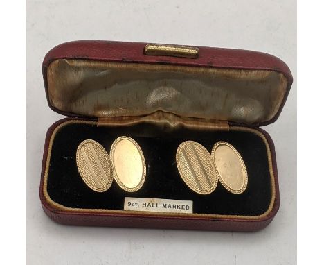 A pair of 9ct gold gents cufflinks with an engine turned design, 5.1gLocation:If there is condition report shown, please requ