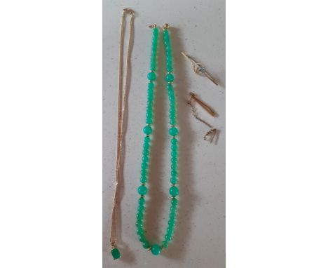 A 14ct gold and jade necklace, stamped 585 to the clasp, total weight 23g together with a 10ct gold chain stamped 10k, 3.5g, 