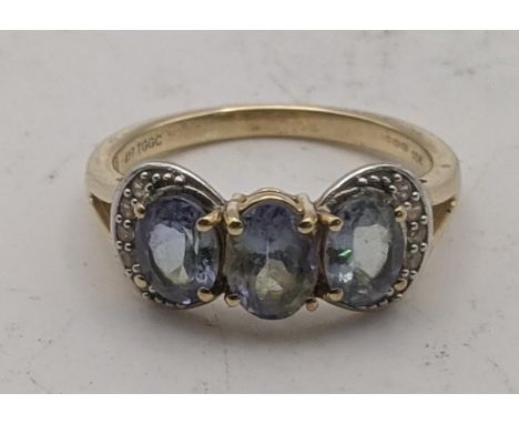 A bi-colour tanzanite and white zircon 9ct gold ring size Q, 3.2gLocation:If there is no condition report shown, please reque
