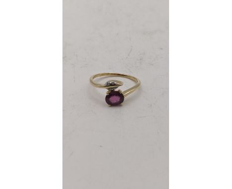 A Burmese pink spinel and diamond 9ct gold ring, Size P 1/2, 2g, with a certificate of authenticityLocation:If there is no co