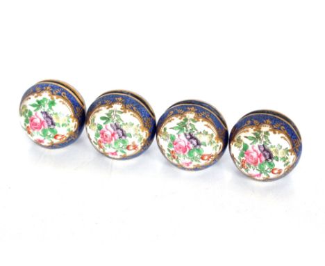 A set of four Crown Staffordshire porcelain menu holders decorated in the Worcester manner with foliate sprays heightened in 