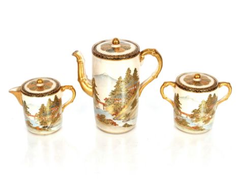 A Japanese Meiji Satsuma coffee set decorated with landscapes heightened in gilt, seal mark to the bases, comprising coffee p